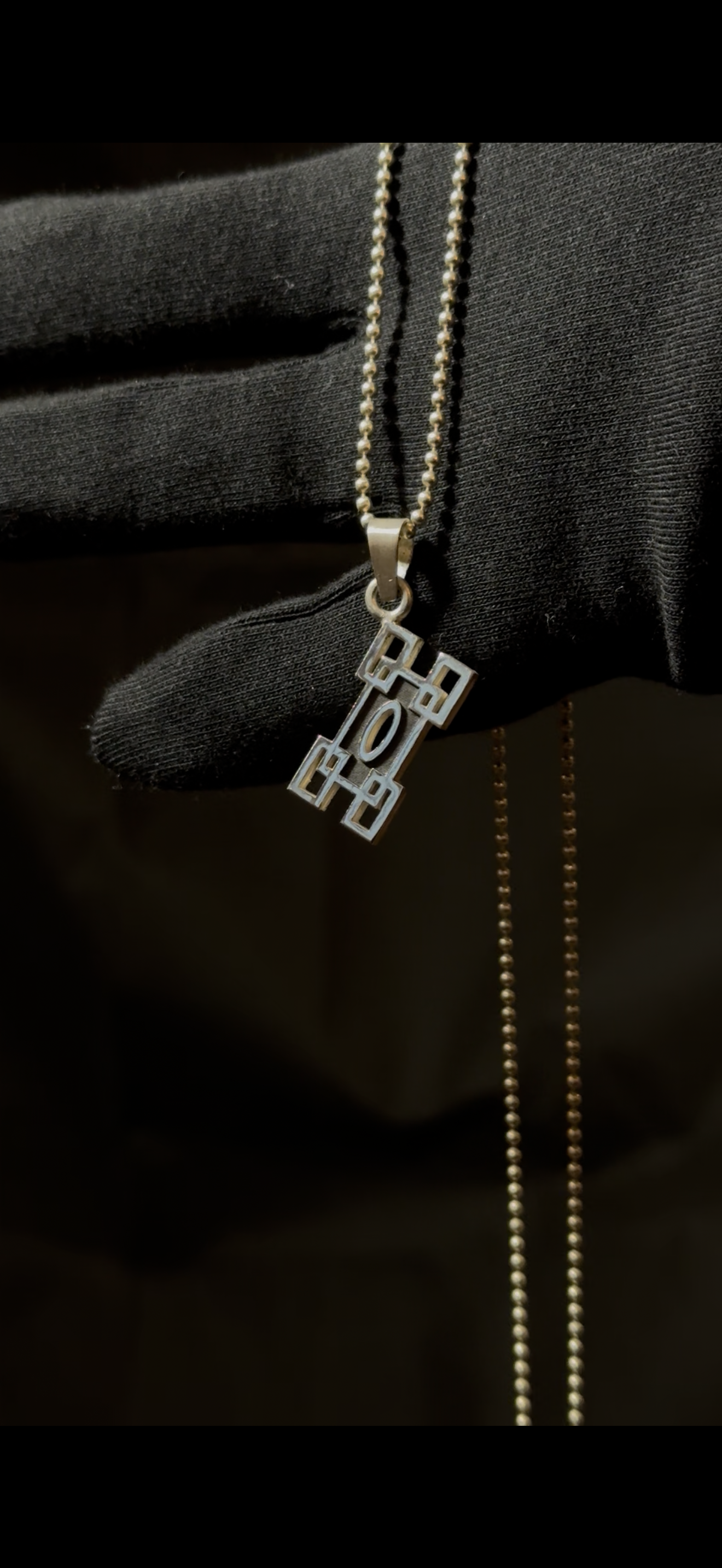 Dije Pilar de la Niebla